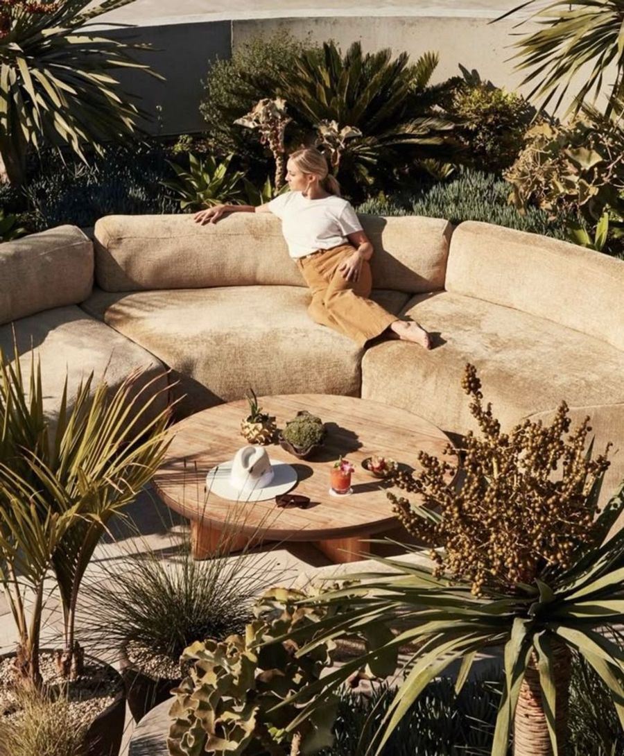 Lounging outdoors among plants